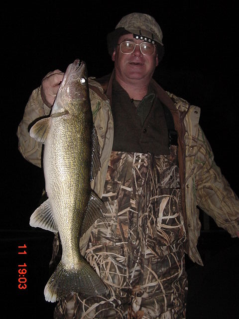 Bruce Feagon with a fat walleye he nailed off the pier at Mar Don Resort