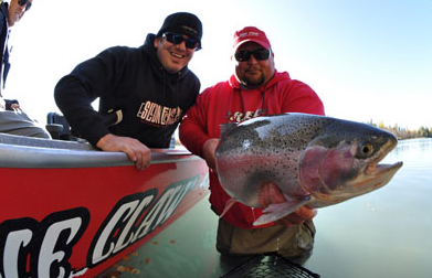 John 
Whitlatch with a trophy Kenai River rainbow trout