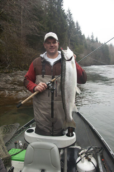 Rob Endsley from the Outdoor Line radio show on 710 ESPN Seattle with a dime bright Bogachiel River steelhead caught on a jig with Bill Meyer from Anglers Guide Service in Forks, Washington