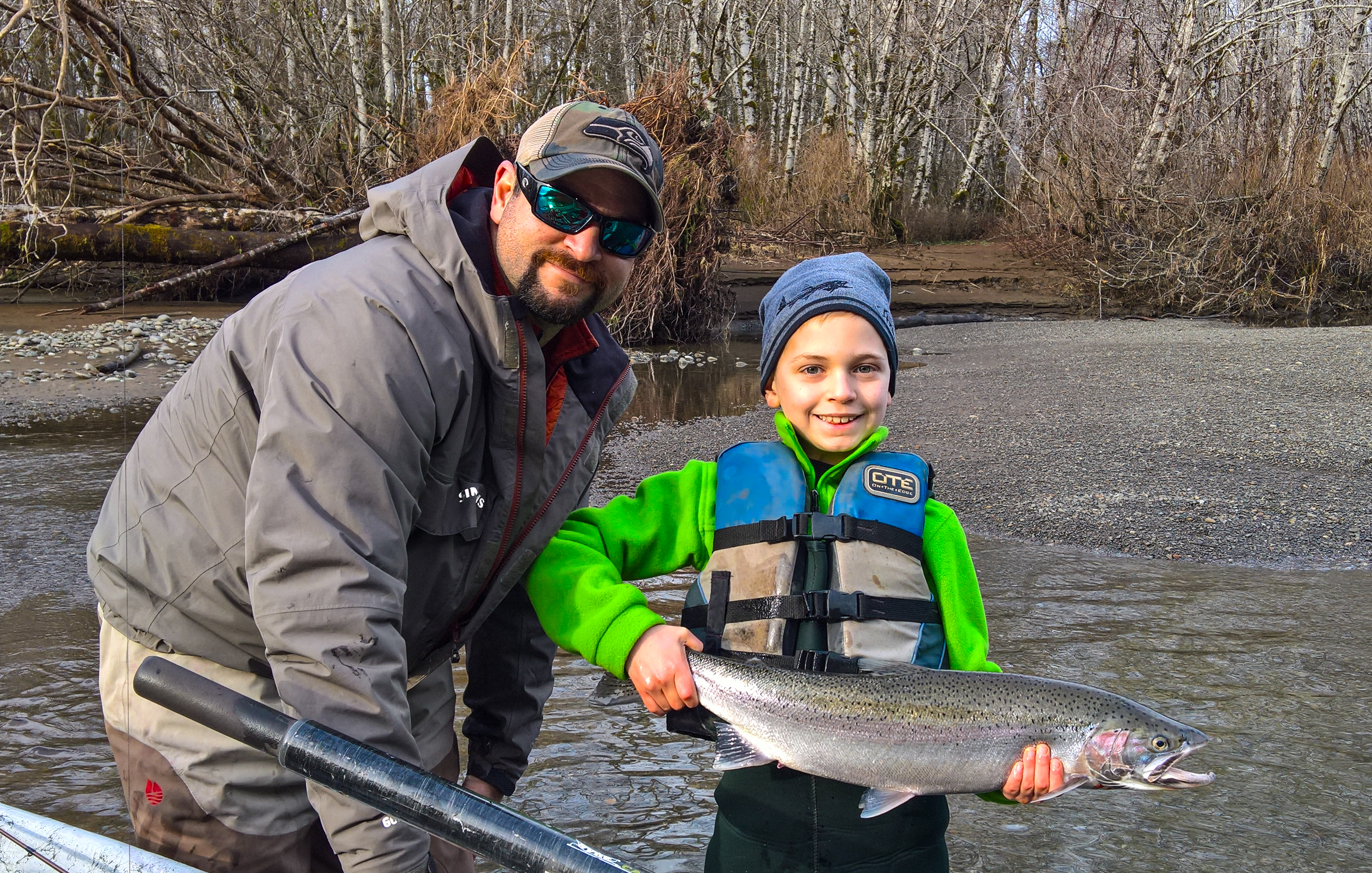 Mike Ainsworth of First Light Guide Service and his son Hunter with a winter steelhead caught bobber dogging-Mike Ainsworth